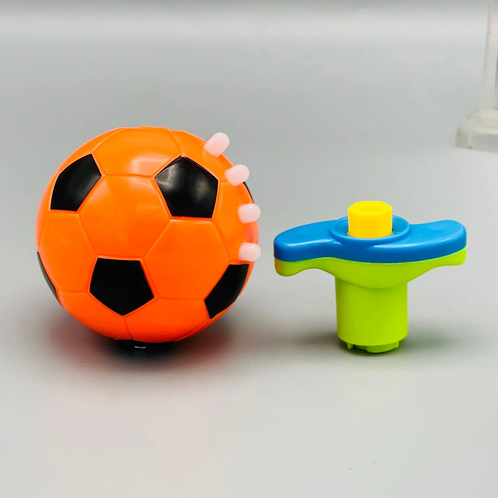Flashing Spinning Football Lifo with Launcher - Image 10